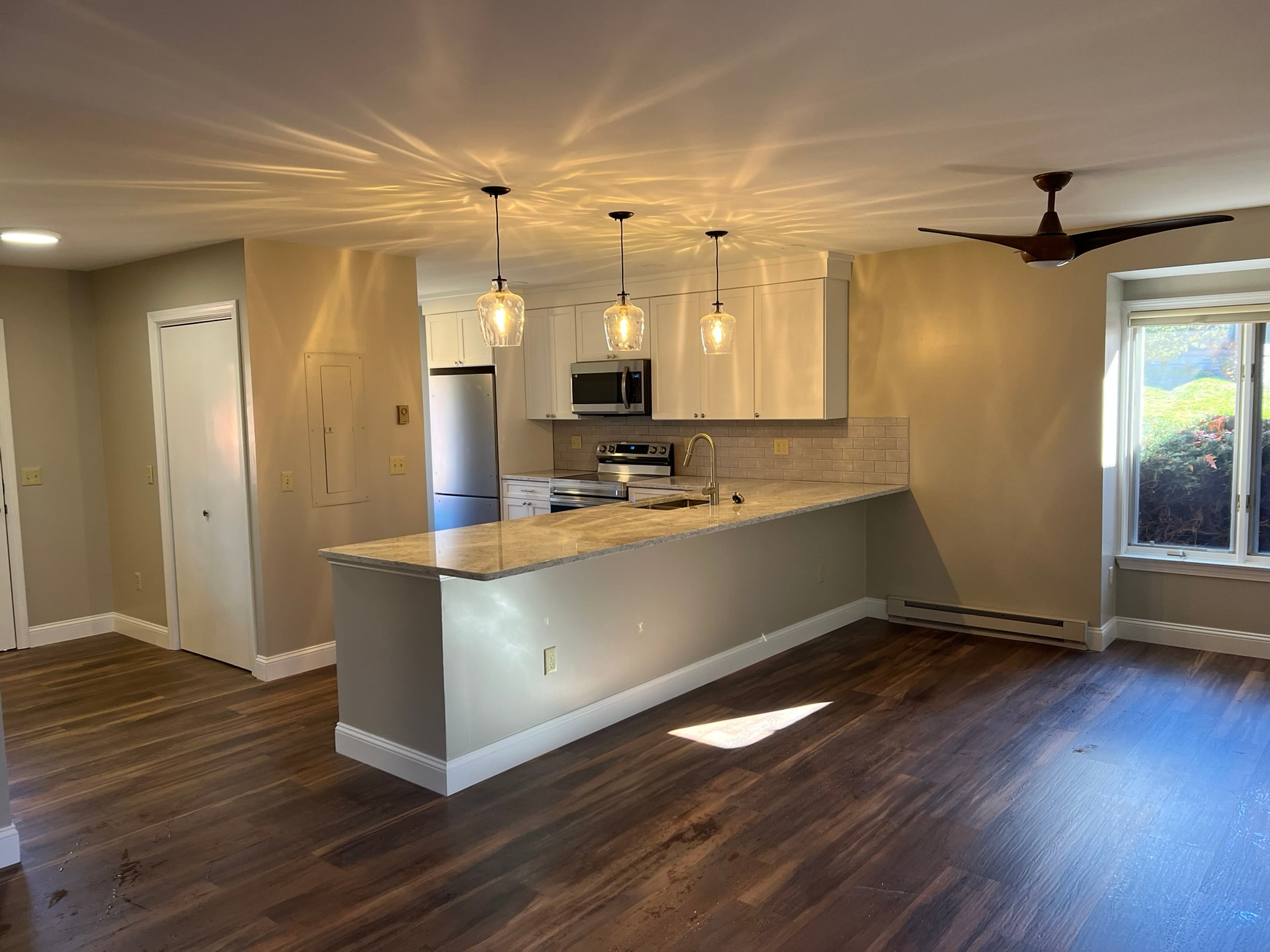 Condo renovation — finished space with new floors, smooth ceilings, rebuilt closets, and fresh paint throughout, Eastern Connecticut