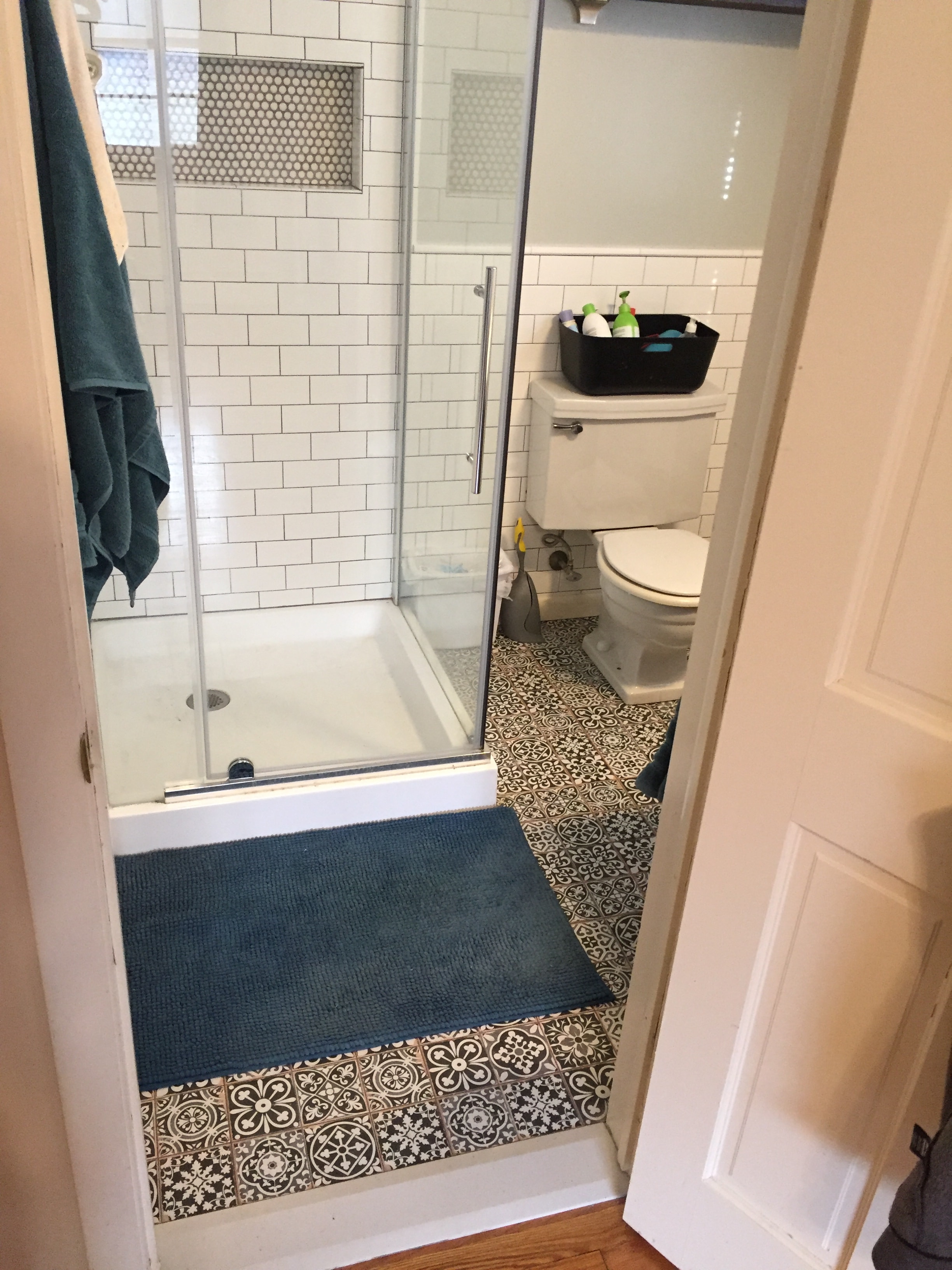 Bathroom renovation — Moroccan patterned floor tile with subway tile wainscotting, overhead view